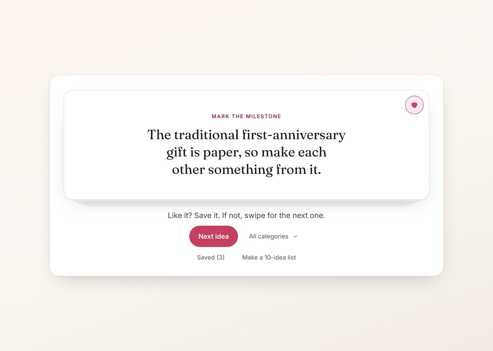 Anniversary date ideas card deck with a paper first-anniversary idea on the top card, the save heart filled and three saved ideas