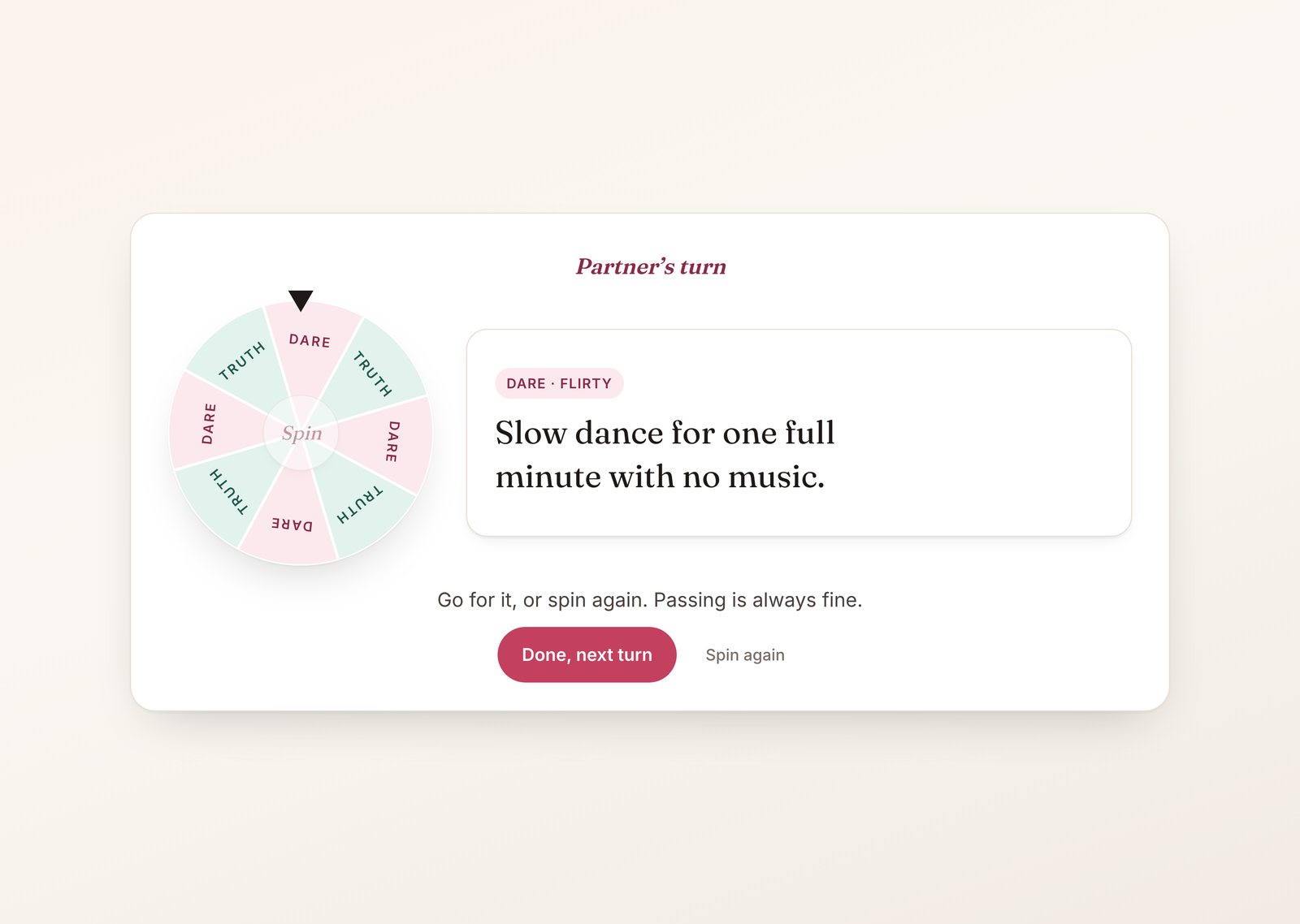 Truth or dare for couples game with a spinning wheel that landed on dare and the flirty dare card it dealt